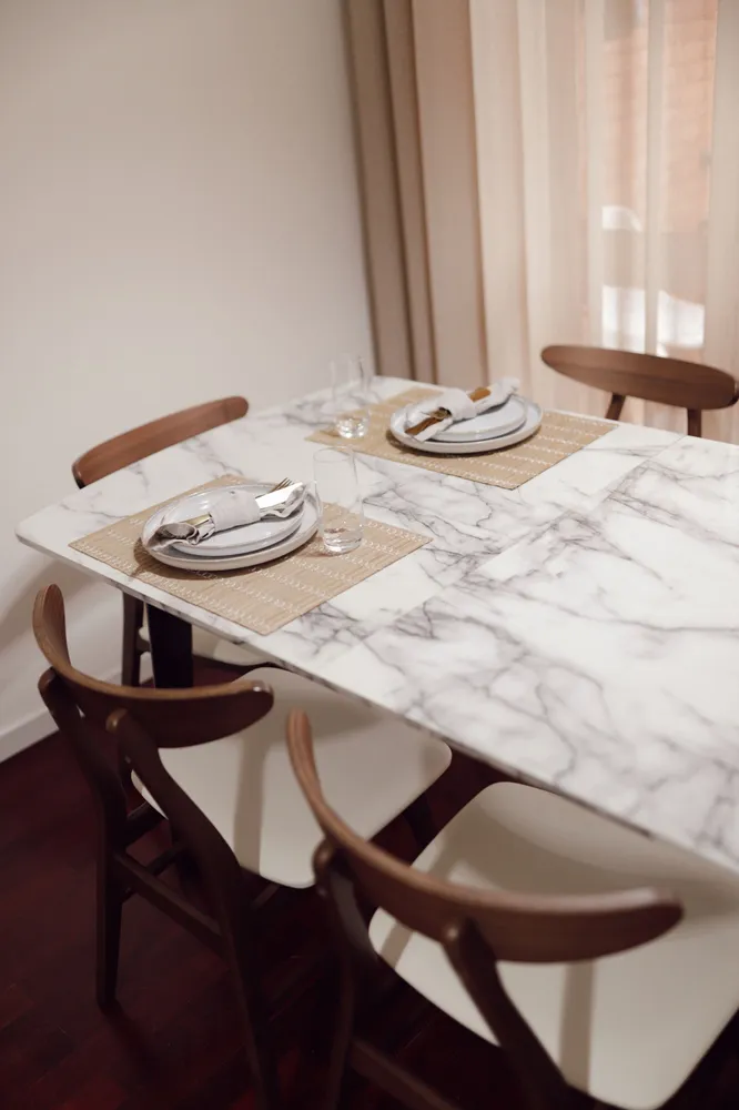 Tavolo da pranzo estensibile bianco/nero 160/200 x 90 cm MOSBY per Ospiti