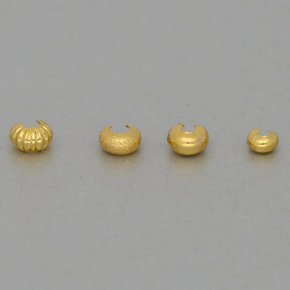 Copri-schiaccini dorati assortiti