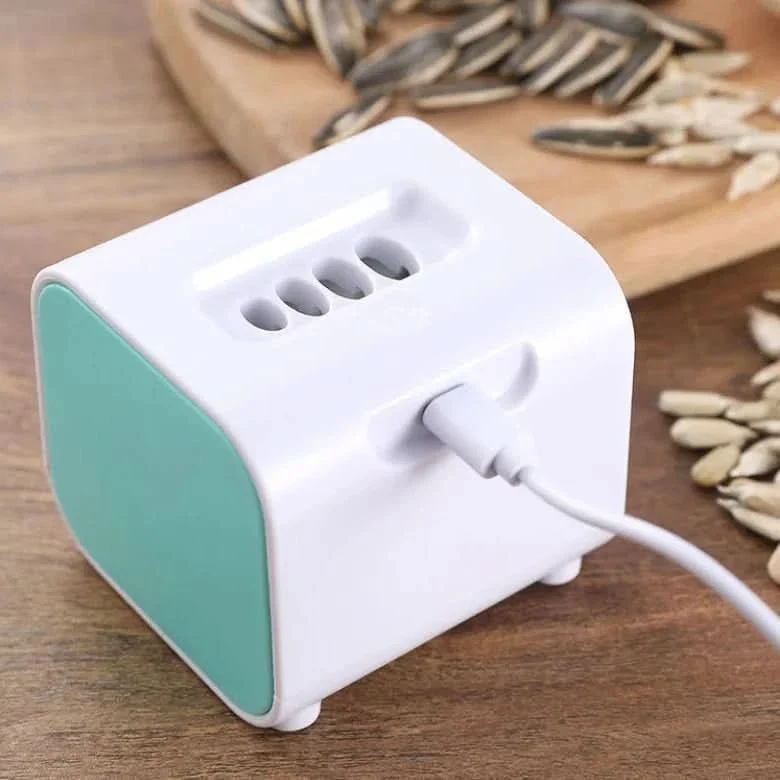CRACKORA – Aiuto automatico per sbucciare semi di melone con design portatile Cozey Maison