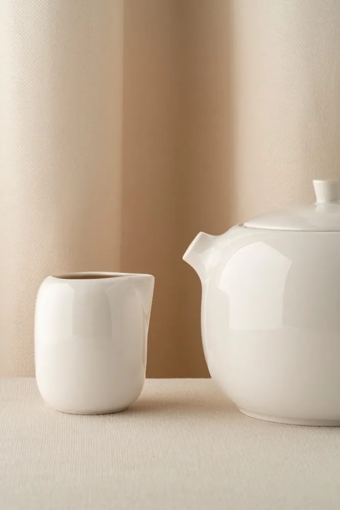 Sottopiatto Madeleine D31,5 cm H3,5 cm alabastro bianco