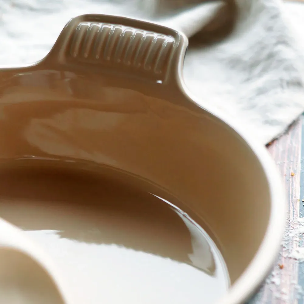 Stampo rotondo ceramica e piatto Le Creuset