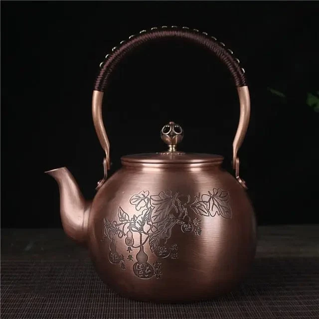 Teiera rotonda cinese rame con foglie 1,5L
